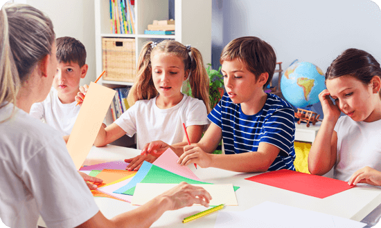 A few children can be seen participating in craft projects.