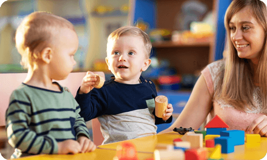 Children playing together in a colorful Day nurseries Wimbledon.